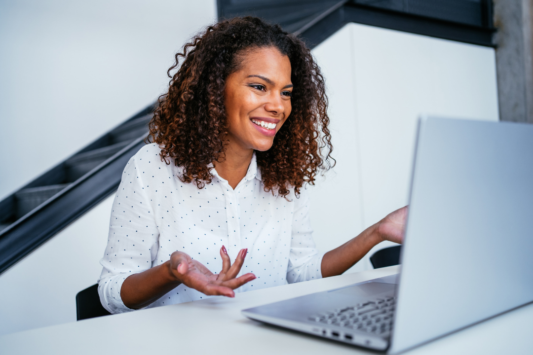 woman sitting in front of computer